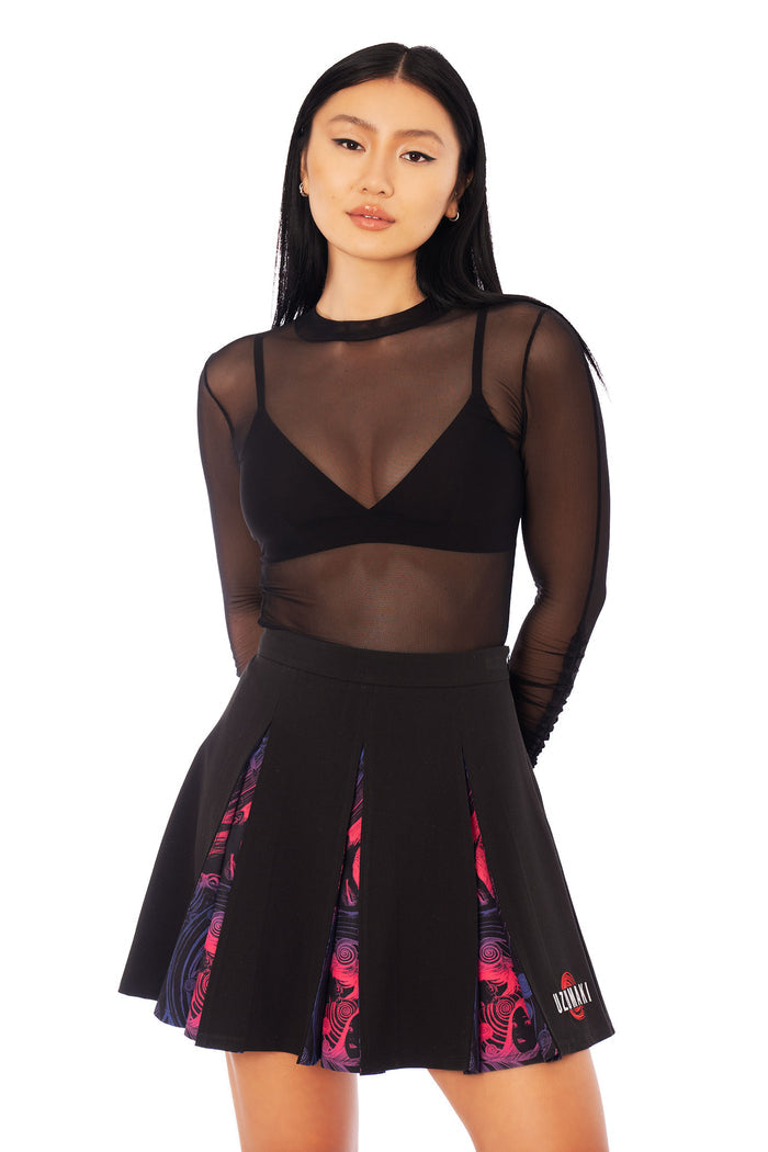Black pleated zip front mini skirt inspired by Junji Ito Uzumaki, manga print clothing with hidden spiral artwork, Harajuku-style Japanese horror fashion.