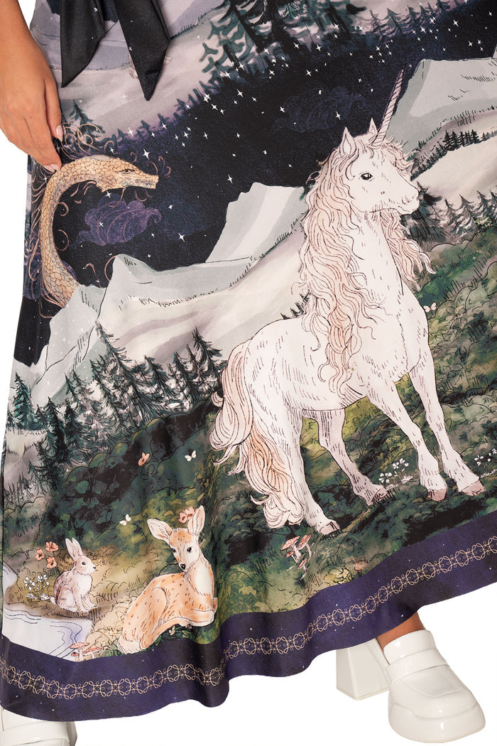 Fantasy inspired maxi dress with kimono sleeves, adjustable wrap waist and unicorn illustration across a flowing silhouette