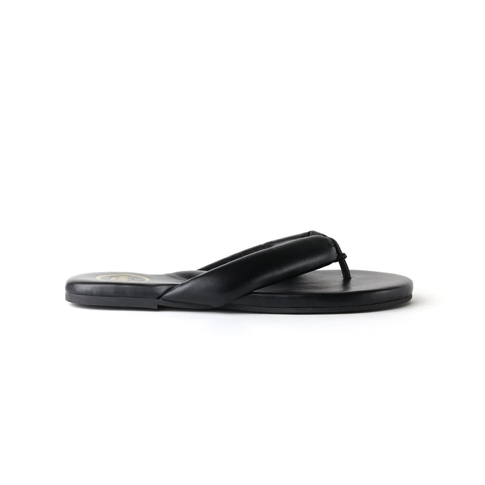 Black rubber flip-flop sandal with thong strap and textured footbed, side view.