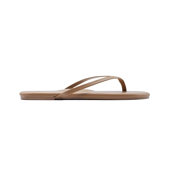 Brown thong flip-flop sandal with thin straps on white background, side view.