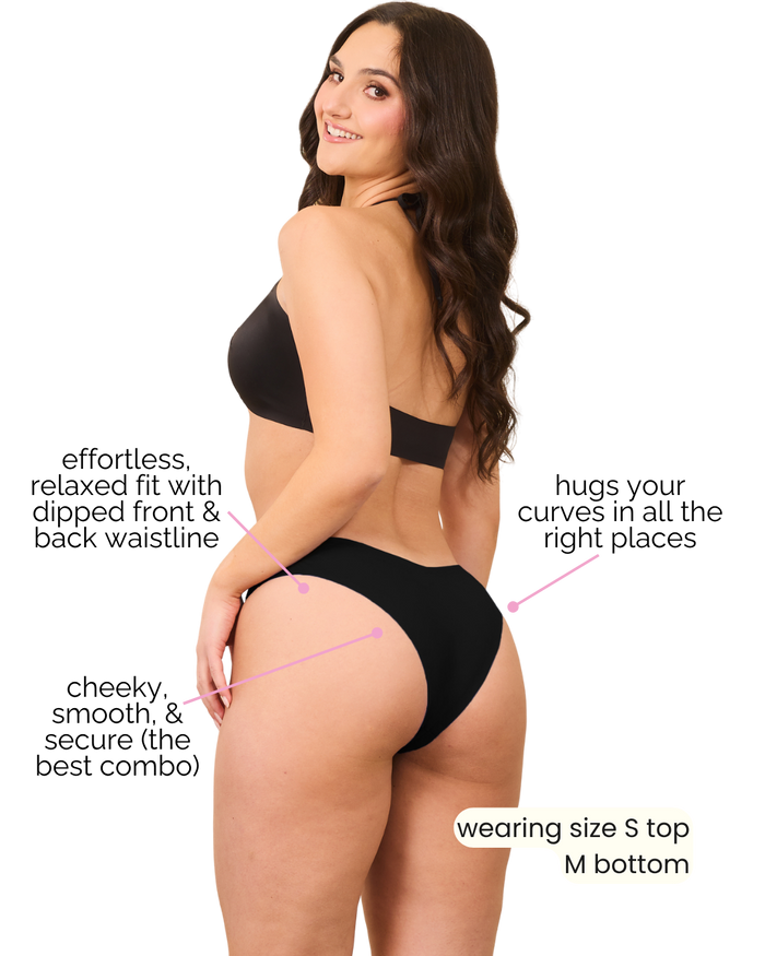 Merritt Dipped Cheeky Bikini Bottom feature graphic showing a model in black swimwear with no-show, raw-cut fit details