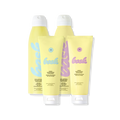 Front view of The Core Four sunscreen bundle with SPF 30 and 50 lotions and non aerosol sprays on a black background